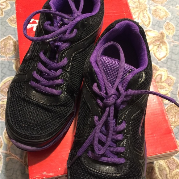 black and purple fila shoes